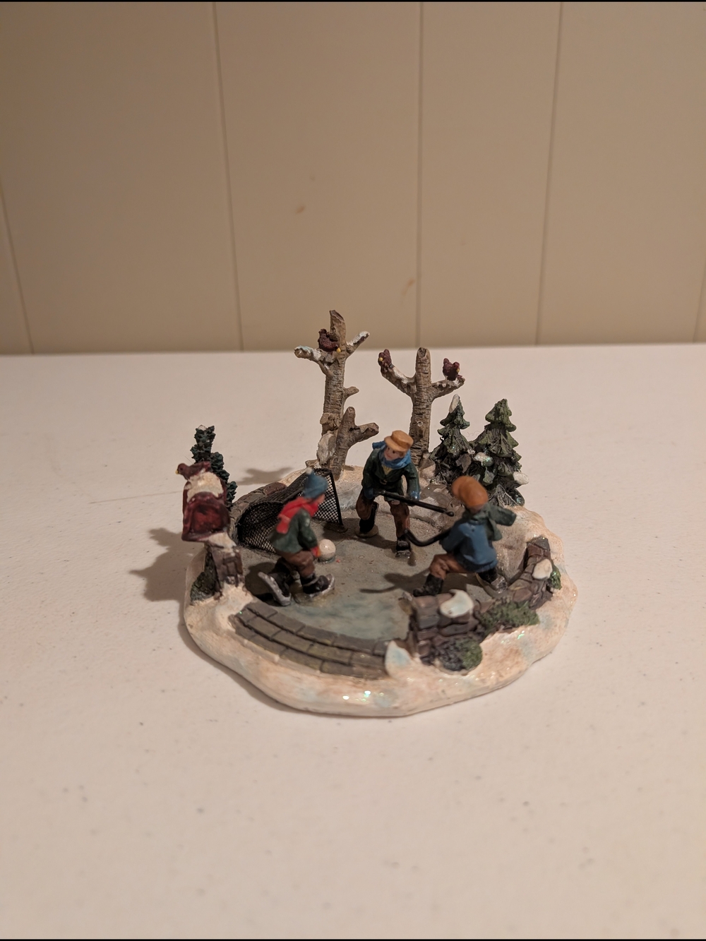 Hand-Painted Winter Village Ice Skating Figurine - Blue and Brown